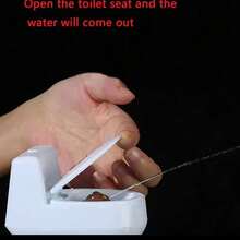 This Mini Prank Toilet Has A Realistic Water Spraying Function That Will Catch Everyone Off Guard! Just Fill It With Water, Sneak Up On The Target, And When The "Surprise" Sprays Out, It Will Elicit Bursts Of Laughter. - White - View 2