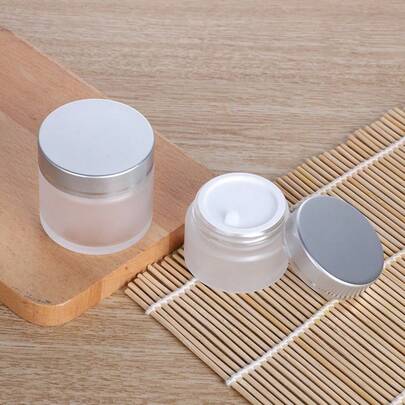 Frasco de vidrio esmerilado con tapa plateada, recipiente vacío rellenable para productos de cuidado de la piel, loción corporal, crema, mascarilla