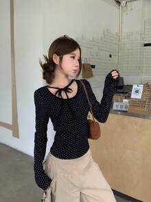 Áo thun nữ mùa xuân mới, kiểu dáng độc đáo, cổ tròn, tay dài, thắt nơ, chấm bi, dáng ôm, gợi cảm, thích hợp mặc thường ngày. - màu đen - Xem 4