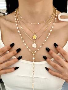 四件套欧美简约金属花朵、仿珍珠、贝壳Y形吊坠项链，适合女性在节日、约会、送礼、日常、休闲、派对、婚礼等场合佩戴。 - 金黃色 - 查看 12