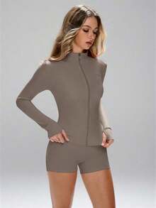 This Sporty Features A Minimalist And Fashionable Style, Combining Collegiate And Athletic Elements. With Long Sleeves And Thumb Holes, Comfortable Stretchy Fabric Is Suitable Dance/Pilates Workouts. Front Zip-Up Design With A Low Collar Allows You To Easily Transition From Street To Gym. With Shaping Seams, A, Full Coverage, Long Sleeves With Thumb Holes, Effective Cinched Waist, Bust Lifting Pleats, And 360-Degree Stretch, This Also Has An Anti-Slip Zipper Guard. Women's Fitted Zip-Up Pink - 棕色 - 查看 9