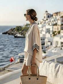 A Relaxed Two-Piece Summer Outfit For Women In A French Style – Featuring A Greek-Inspired V-Neck Top With Wide Sleeves And High-Waisted Shorts, Perfect For Casual Elegance And Comfort At The Beach - Beige - View 4