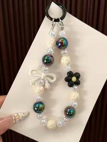 1个时尚优雅蝴蝶钥匙扣 | 亚克力和铁材质，非常适合挂在女士包包上、车钥匙上，也是节日礼物的理想之选 - 彩色 - 查看 16