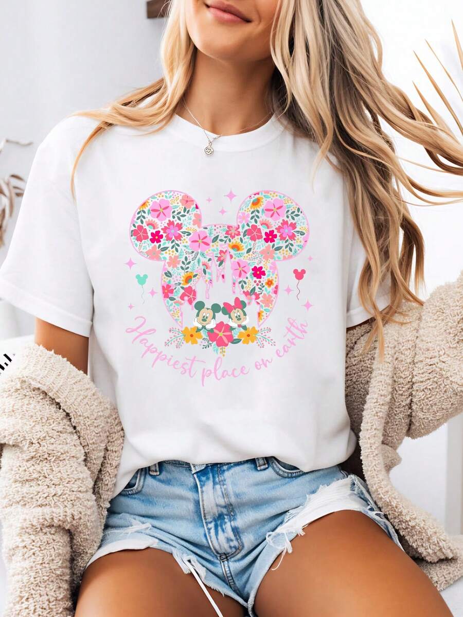 Disney-Style Women's Printed T-Shirt Featuring A Cartoon Print Of Mickey And Minnie Mouse Amidst A Floral Pattern Shaped Like Mickey's Head. This Round-Neck Summer Top Is Crafted From Soft, Comfortable 100% Cotton Fabric, Perfect For Everyday Wear, Outdoor Activities, Or Shopping. It Also Makes An Ideal Choice For Women's Vacation Wear. - White - View 1