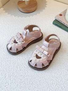 1 đôi dép xăng đan hình trái tim và nơ dễ thương cho bé gái, đế mềm chống trơn trượt. - Màu be - Xem 3