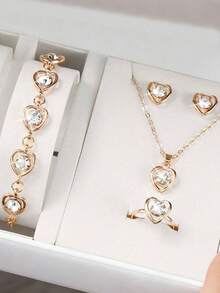 6 PIÈCES Ensemble d'accessoires de style de luxe doux pour femmes (comprenant une montre à quartz cadran carré doré rose avec bracelet  blanc, un bracelet en forme de cœur, un collier en forme de cœur, des boucles d'oreilles clous en forme de cœur, une bague en forme de cœur, un portefeuille  décoré d'un nœud noir). - Blanc - Voir 7