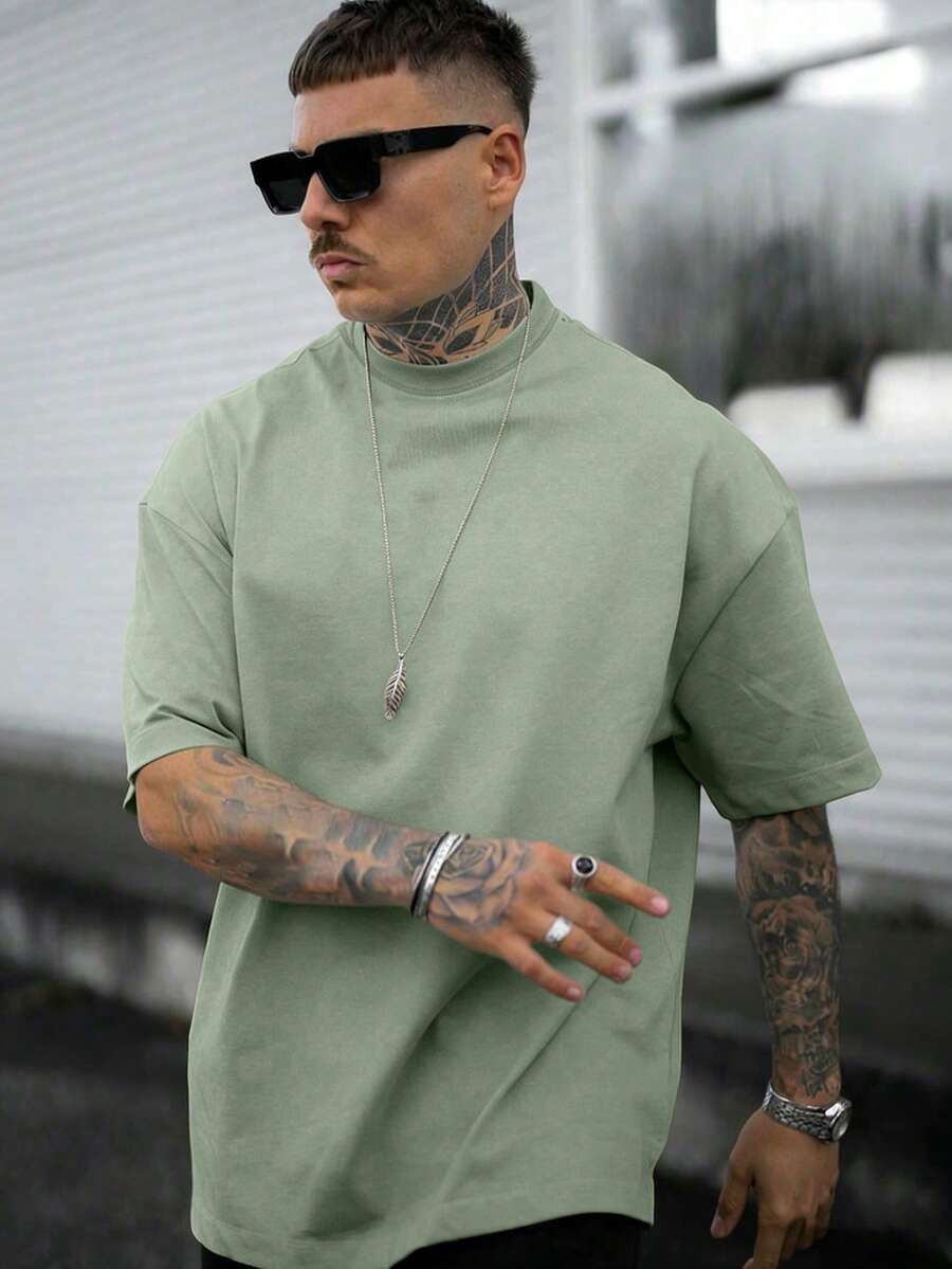 Camiseta de manga corta de verano versátil, suelta y ligera, de unicolor y baja elasticidad, minimalista para hombres - verde menta - Ver 1