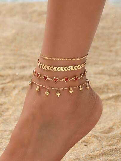 4件套时尚多层金色脚链套装，配红色爱心和流苏吊坠，适合日常佩戴、派对、海滩度假等场合。