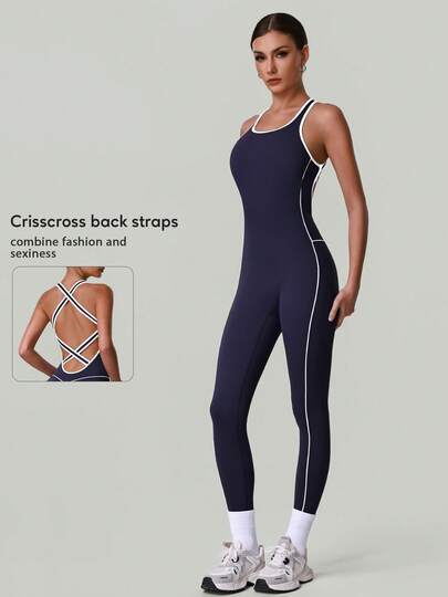 Bộ jumpsuit thể thao, tập luyện, yoga không tay, lưng chéo, ôm sát, phối màu tương phản dành cho nữ.