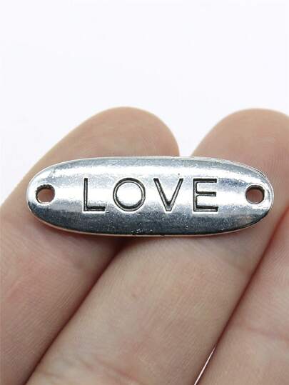 10 chiếc mặt dây chuyền hình trái tim kích thước 34x11mm dùng để tự làm vòng tay, vòng cổ, trang sức, phụ kiện thủ công mỹ nghệ.