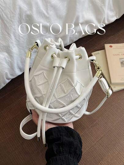 女士春夏新款纯色PU抽绳褶皱水桶包，刺绣花卉装饰，百搭通勤优雅单肩包