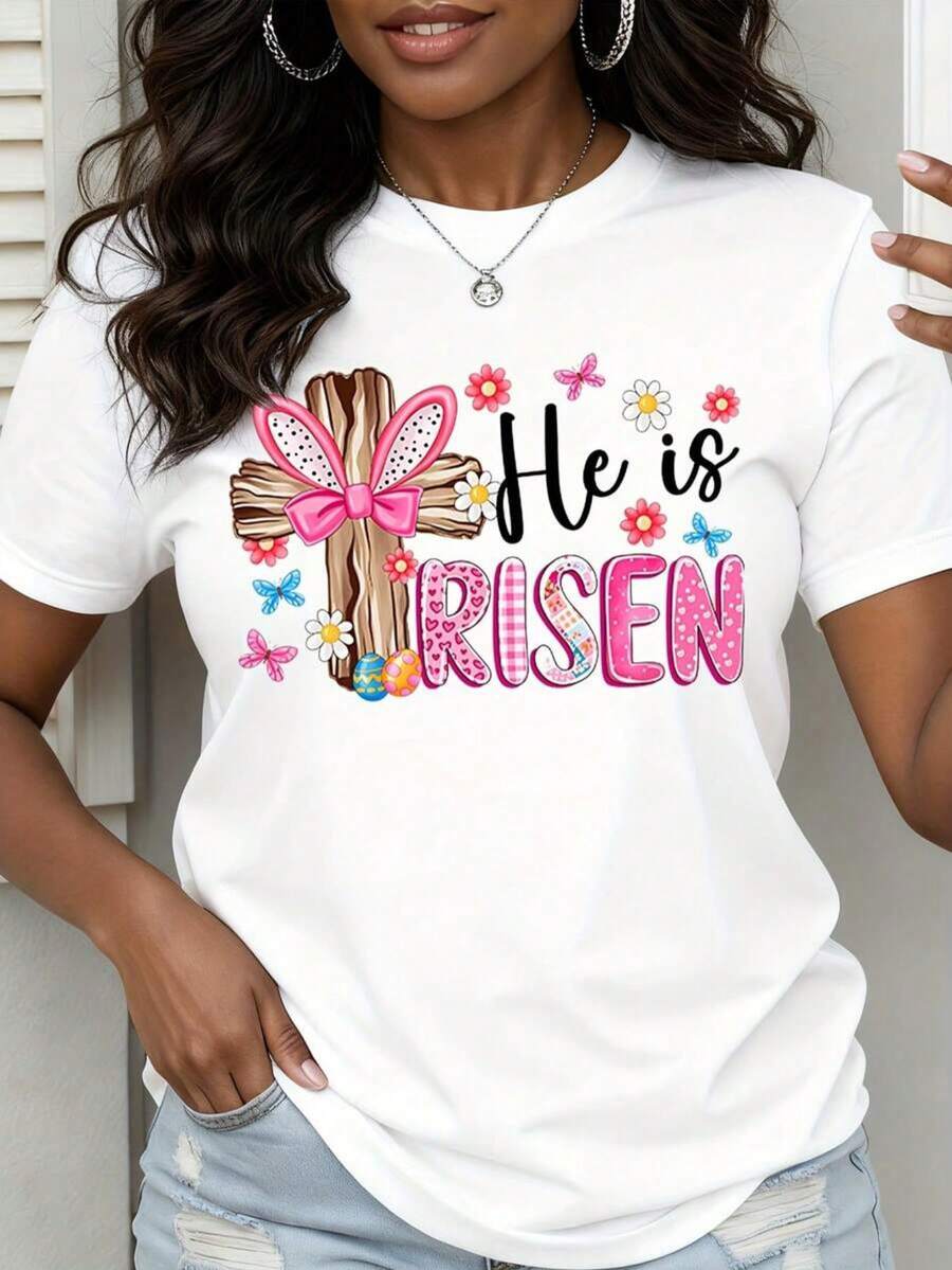 Camiseta de verano holgada para mujer con orejas de conejo y cruz, con la frase "He is RISEN" y estampados florales de huevos coloridos. Esta versátil camiseta de manga corta es cómoda y transpirable, con un diseño clásico de cuello redondo, adecuada para el uso diario, citas o vestimenta informal. - Blanco - Ver 1