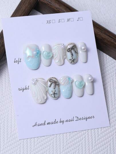 10pcs/Set Handmade Short Oval Nail Pieces With Y2K Light Blue Ocean Style & 3D Hand Painted Shell & Handcrafted Sea Star Heart And Bowknot Design For Nail Decoration. 1 Piece Of Jelly Gel And 1 Piece Of Nail File. Perfect For Wearing At Parties And Formal Occasions, Suitable For Press On Nails And Nail Care Products.