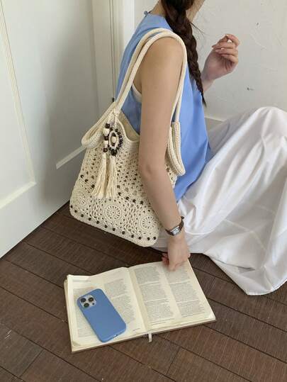 新款春夏大容量镂空流苏单肩包，女士度假风沙滩编织包