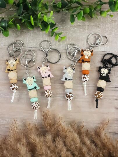 1 pieza Llavero de silicona con cuentas, dije de bolso, llavero, accesorio antiperidida para llaves de coche con estampado de dibujos animados de estilo occidental de yak/vaca, regalo para amigos y familiares