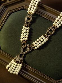 Vintage Luxurious Double-Layer Pearl Twist Chain Tassel Necklace | A Captivating Choice For Palace-Style Retro Parties. Featuring An Antique Copper Alloy Heart-Shaped Tassel Silhouette, Exquisite Craftsmanship Showcases A Retro Elegant Vibe, Suitable For Formal Dinners, Weddings, And Everyday Wear, Helping You Effortlessly Capture A Palace-Style Retro Ambiance. - Multicolor - View 2