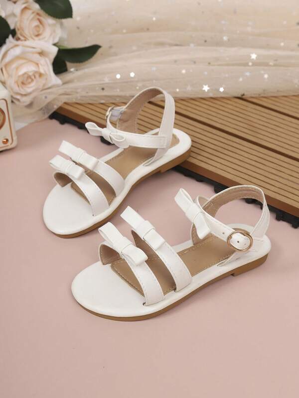 1双新款时尚可爱蝴蝶结设计平底凉鞋，适合女孩户外、派对、公主装扮、夏季穿着