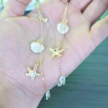 1 قطعة سلسلة نظارات معدنية مزينة بالخرز والنجمة البحرية، مناسبة لسلاسل نظارات الشمس للنساء في السفر والعطلات، مصنوعة من الفولاذ المقاوم للصدأ - الذهبي - مشاهدة 2