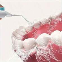 Máy tăm nước áp lực cao cầm tay, thiết bị làm sạch răng, thiết bị súc miệng. Được làm từ chất liệu ABS, với công nghệ xung áp lực cao, thiết kế nút bấm và vòi phun có thể tháo rời. Lý tưởng để làm sạch răng và chăm sóc răng miệng, không cần động cơ điện, thích hợp cho gia đình và khi đi du lịch. Cần thiết cho việc chăm sóc răng miệng | Thiết bị tăm nước nha khoa kiểu dáng đẹp | Thiết kế cầm tay, máy tăm nước - trắng - Xem 6