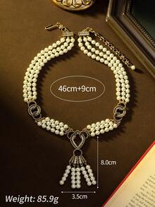 Vintage Luxurious Double-Layer Pearl Twist Chain Tassel Necklace | A Captivating Choice For Palace-Style Retro Parties. Featuring An Antique Copper Alloy Heart-Shaped Tassel Silhouette, Exquisite Craftsmanship Showcases A Retro Elegant Vibe, Suitable For Formal Dinners, Weddings, And Everyday Wear, Helping You Effortlessly Capture A Palace-Style Retro Ambiance. - Multicolor - View 5