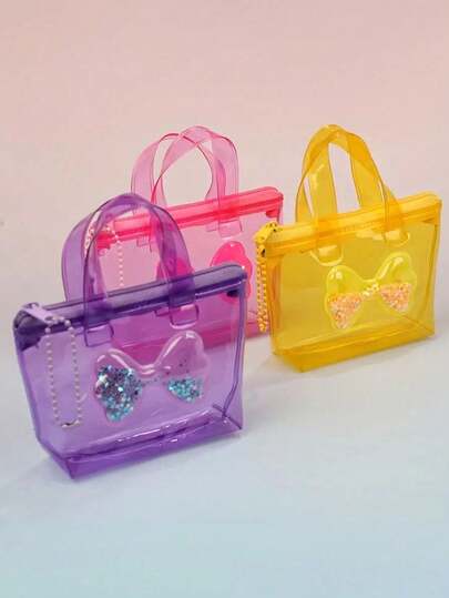 Sac à main mini en gelée transparent de haute qualité , Sac d'embrayage mignon avec nœud et paillettes pour fille, pochette portable pour maquillage et écouteurs, poignée solide, 4 couleurs (violet/jaune/rose/bleu), portefeuille