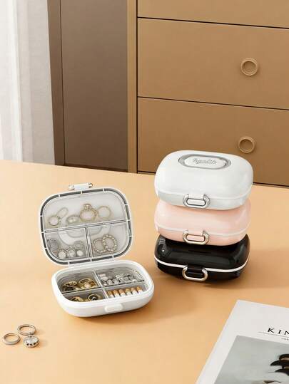 1个全新双层独立7格迷你首饰收纳盒，透明内衬，便携式旅行药盒，胶囊式设计，防水防潮，可放入口袋或包包，不占空间，多功能收纳盒，适合放置耳环、项链、戒指、首饰、维生素、药品和营养补充剂，桌面小物，家庭旅行必备配件，（黑色、白色、粉色可选）可重复使用，男女通用