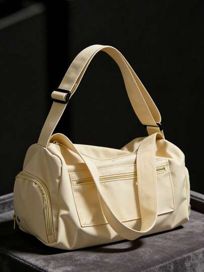 La nueva moda clásica del Joker de unicolor, de gran capacidad y con múltiples bolsillos, con auriculares, está diseñada para ser ligera y portátil, y el bolso de hombro es adecuado para viajes al aire libre y viajes a corta distancia. Bolso para accesorios escolares y cosas de la escuela