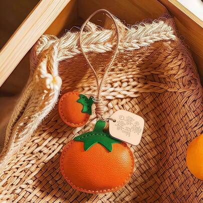 Handmade Creative "Persimmons Bring Good Fortune" Pu Leather Novelty Keychain Bag Charm For Women - Comes With 2 Persimmon-Shaped Pu Leather Charms And A "Persimmons Bring Good Fortune" Tag, Suitable For Car Interior Decoration, Handbags, Backpacks, Keychains - Easy To Install, Lightweight, Charming Hand-Crocheted Persimmon Car Decoration.