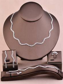 CORUIXI 1 set de bijoux délicats en strass pour femmes, comprenant un collier à vagues dorées, un bracelet, des boucles d'oreilles, une bague. Convient pour la mariée, la demoiselle d'honneur, boule de cristal, cadeau pour les filles - Doré - Voir 1