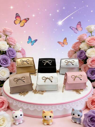 这款时尚甜美的迷你方形零钱包采用PU材质，配有磁扣和蝴蝶结，纯色设计。它融合了独特的韩式和法式美学，是一款百搭、休闲、时尚且经济实惠的选择，非常适合外出、户外活动和日常使用。它也是送给朋友的完美礼物。