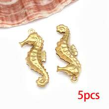 5/10个不锈钢海洋动物吊坠，包括海星、贝壳、海豚等镂空造型，适合夏季海滩主题，可用于夏威夷珠宝制作。 - 彩色 - 查看 9