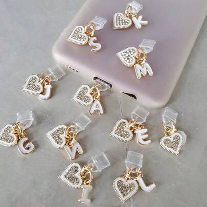 Nút bịt bụi hình trái tim đính đá lấp lánh dễ thương, thích hợp cho máy đọc sách điện tử, điện thoại, máy tính bảng và các thiết bị khác. Phụ kiện công nghệ thú vị, quà tặng sinh nhật.