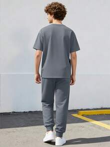 Bộ đồ thể thao ngắn tay và quần jogger cho tuổi teen mùa xuân/hè, phối màu đen trắng xám, in số 23, trang phục thường ngày thoải mái, năng động, phù hợp cho đi học, đi làm và các dịp giao lưu nhẹ nhàng. - Xám - Xem 4