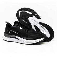 Black And White Athletic Running Shoes With A Comfortable High Sole, Ideal For Running, Walking, And Gym Workouts. - Black and White - View 1
