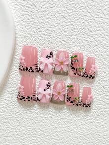 10件套甜美花卉美甲套装，包含凝胶美甲套装、粉色花朵、水晶樱桃、粉色蝴蝶结美甲装饰、斑马纹美甲配件、浅棕色指甲油，以及美甲工具（1个果冻贴纸+1个指甲锉）。三种尺寸可选：杏仁形、鸭嘴形、棺材形、法式心形。这款美甲套装非常适合春夏时节的女士和女孩，适合派对、日常、通勤、拍照等场合，也是一份很棒的礼物。 - 彩色 - 查看 11