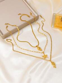 3件套可爱夏季海洋主题不锈钢吊坠项链，包含星星、贝壳、鱼等元素，适合女性日常佩戴和度假配饰 - 金色 - 查看 4