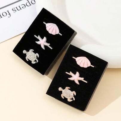 2026 Anillo decorativo de lujo unisex con tortuga marina, estrella de mar y concha para la correa del , con encantos de metal con incrustaciones de cristal brillante de diamante de imitación, accesorios de correa de silicona para reloj inteligente, decoración de joyería animal linda, 2 colores: oro rosa/plata