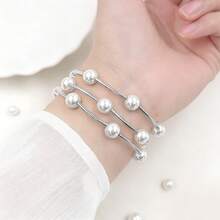 1条奢华夸张仿珍珠弹力手链表带，兼容表带38mm 40mm 41mm 44mm 45mm 49mm（S10 42mm）（S10 46mm），时尚复古魅力手链表带，兼容 Series 11 Ultra 3 SE3 Ultra 2 S10 SE2 9 8 7 SE 6 5 4 3 2 1，适合搭配各种服饰，日常佩戴，假日休闲。 - 銀色 - 查看 3