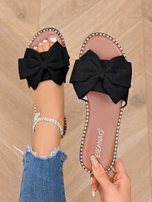 Dép lê kiểu dáng dễ thương, ngọt ngào với nơ và đinh tán, đa năng cho các bạn nữ trẻ đi làm hàng ngày, hẹn hò và dạo chơi mùa hè. - màu đen - Xem 1