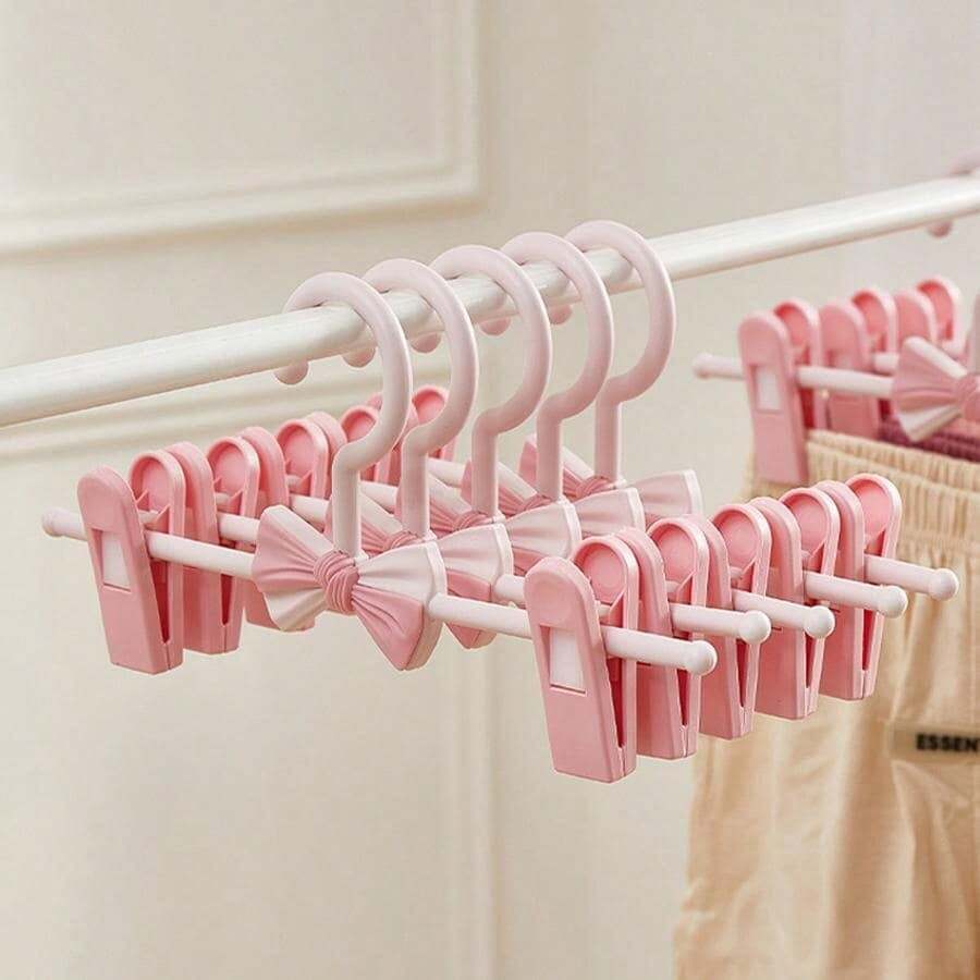2pcs/5pcs Mini Non-Slip Clothes Hanger Trouser Clip Adjustable Telescopic Seamless Trouser Hanger Household Non-Slip Baby And Child Clothes Drying Rack - Pink - View 1