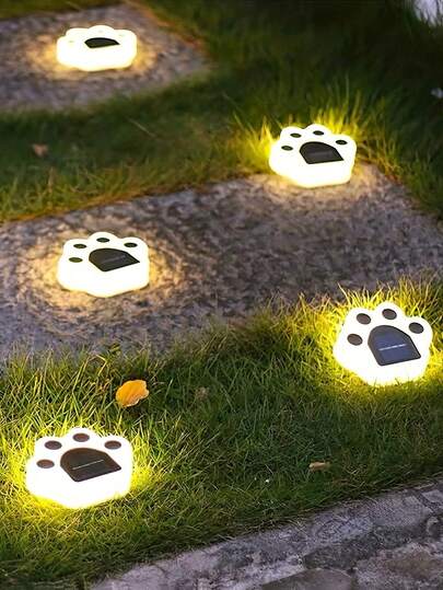 4 قطع أضواء بصمة الأقدام الشمسية، أضواء حديقة شمسية، أضواء ممر شمسية، أضواء فناء شمسية، أضواء خارجية شمسية، أضواء بصمة قط كلب حيوان، أضواء ممر LED، مناسبة للفناء والحديقة والمدخل والفيلا