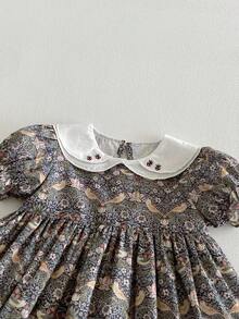 1 chiếc đầm dáng rộng họa tiết hoa nhí cổ Peter Pan cho bé gái, thích hợp mặc mùa hè. - Màu xanh Ô liu - Xem 8