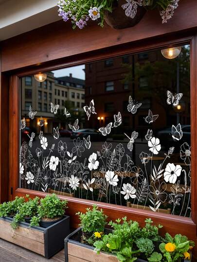 1张白色花蝶图案自粘静电玻璃贴纸，适用于装饰商店橱窗和家庭窗户玻璃。