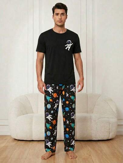 Men's Astronaut Graphic Short Sleeve T-Shirt And Space Planet Print Pants Pajama Set, Designed With Playful Motifs And Comfort, Suitable For Lounging, Relaxing Before Bed, Or Casual Weekend Wear