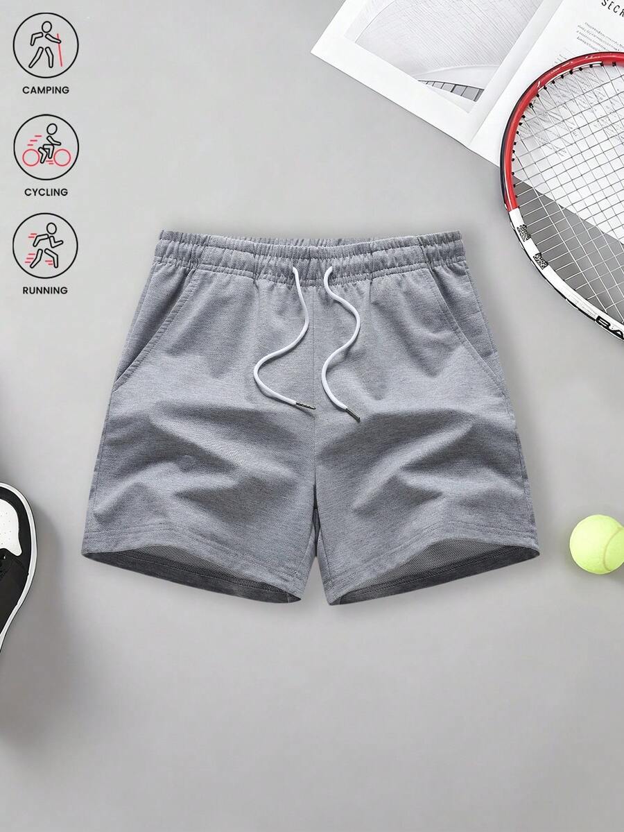 女款素色運動短褲 (1件裝)。面料透氣、柔軟且高彈性,非常適合跑步、健身和休閒穿著。 - 灰色 - 查看 1
