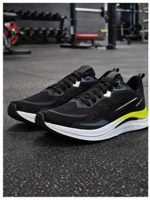 Black And White Athletic Running Shoes With A Comfortable High Sole, Ideal For Running, Walking, And Gym Workouts. - Lime Green - View 4