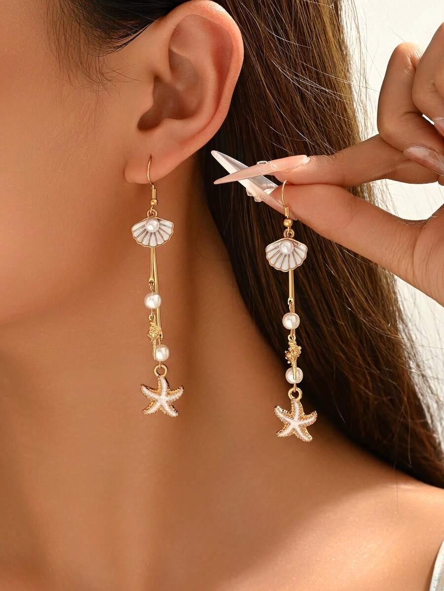 1 Đôi bông tai kiểu dáng đại dương lãng mạn hình vỏ sò và tua rua, bông tai ngọc trai giả thanh lịch, trang sức nữ, thích hợp để đeo hàng ngày, hẹn hò và đi nghỉ mát ở bãi biển. Hình dạng và họa tiết vỏ sò được sắp xếp ngẫu nhiên, được làm từ chất liệu vỏ sò tự nhiên. - Gió biển - Xem 1