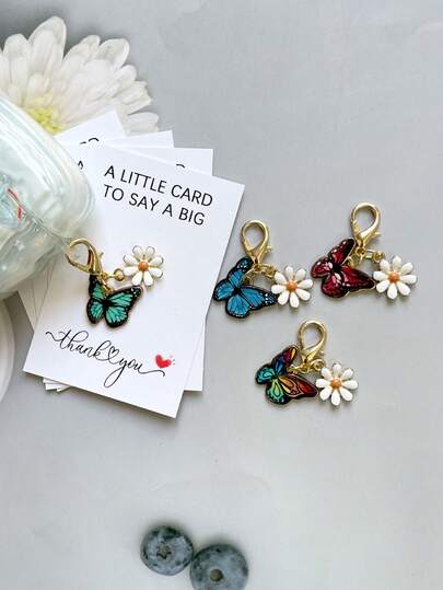 1 set Porte-clés coloré avec papillon et marguerite, design thématique animal avec carte "Merci" à câliner. Meilleur cadeau pour toute femme, mère, sœur, petite amie. Mois de sensibilisation à l'égalité des sexes, Thanksgiving, amitié. Convient pour les accessoires de sac, les mariages, les remises de diplômes, les fêtes de rentrée scolaire. Cadeau charmant pour la famille, les amis et les amateurs de papillons.
