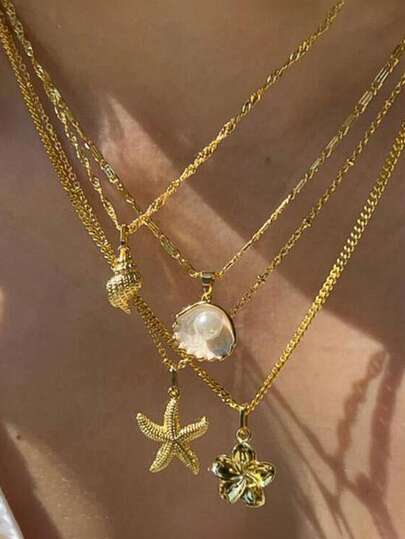 Set de 4 collares de mujer con accesorios apilados de estrellas de mar, conchas y flores de perlas de estilo europeo y americano