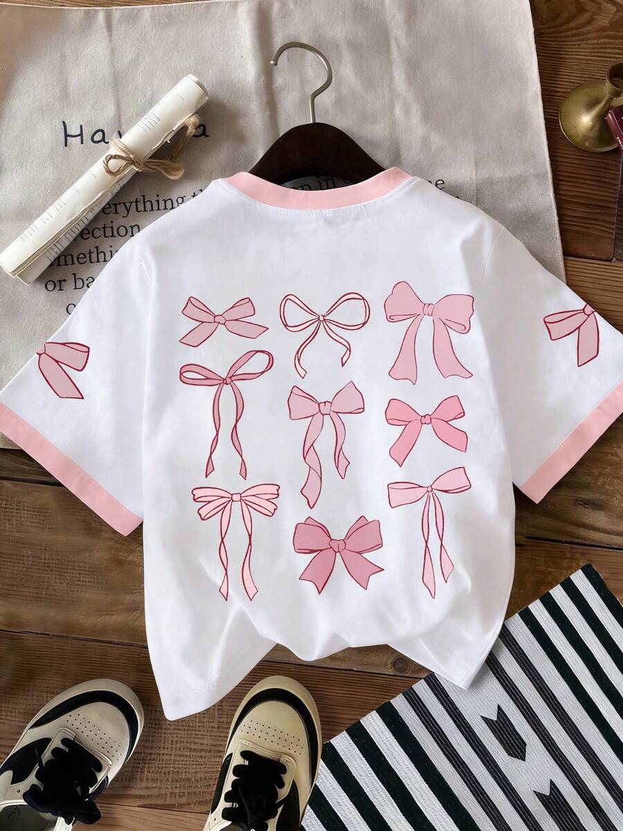 Áo thun nữ tuổi teen màu hồng in hình nơ, chất liệu mềm mại, thoải mái cho mùa hè. - Hồng - Xem 1